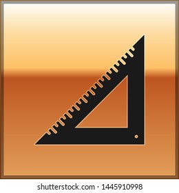 Black Triangular ruler icon isolated on gold background. Straightedge symbol. Geometric symbol.  Vector Illustration