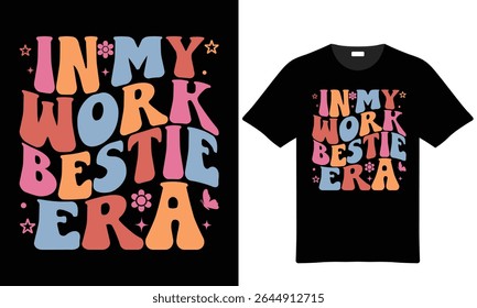 A black t-shirt mockup displays a retro-style text design In My Work Bestie Era in pastel colors with small floral and butterfly accents.