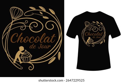 A black t-shirt showcases a stylish chocolate design with a whisk, cupcake, and flourishes in gold tones.