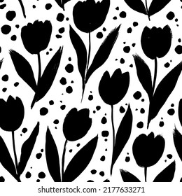 Black tulips with dots vector seamless pattern. Hand drawing, sketchy style of tulips. Flower silhouettes. Black botanical ink ornament. Hand drawn painting for your fabric, wrapping paper, wallpaper.