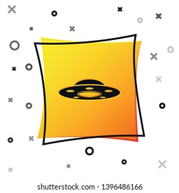 Black UFO flying spaceship icon isolated on white background. Flying saucer. Alien space ship. Futuristic unknown flying object. Yellow square button. Vector Illustration