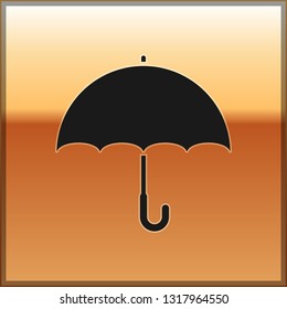 Black Umbrella icon isolated on gold background. Vector Illustration