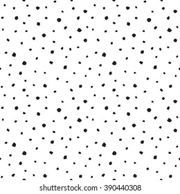 Black uneven specks, spots, blobs, splashes seamless pattern. Free hand drawn speckles, flecks, stains or dots of different size texture. Abstract monochrome background.