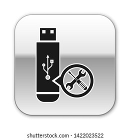 Black USB flash drive with screwdriver and wrench icon isolated on white background. Adjusting, service, setting, maintenance, repair, fixing. Silver square button. Vector Illustration