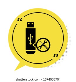 Black USB flash drive with screwdriver and wrench icon isolated on white background. Adjusting, service, setting, maintenance, repair, fixing. Yellow speech bubble symbol. Vector Illustration