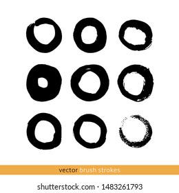 black vector brush strokes circles of paint on white background 