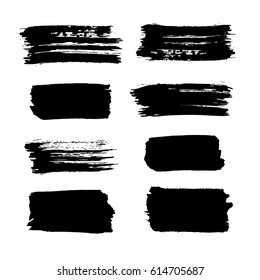 black vector brush strokes of paint on white background 