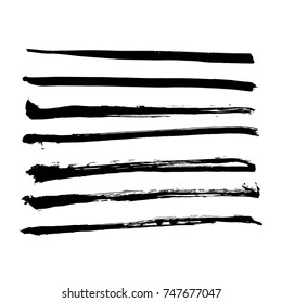 black vector brush strokes of paint on white background 