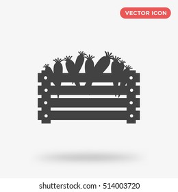 Black vector illustration of a wooden box with isolated carrots icon on white background