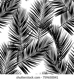 Black vector palm leaves on white background. Hand drawn seamless pattern. Perfect for fabric, wallpaper or giftwrap.