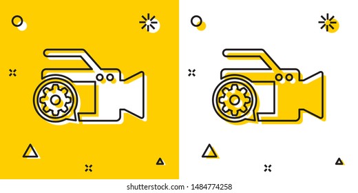 Black Video camera and gear icon isolated on yellow and white background. Adjusting app, service concept, setting options, maintenance, repair, fixing. Random dynamic shapes. Vector Illustration