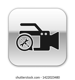 Black Video camera with screwdriver and wrench icon isolated on white background. Adjusting, service, setting, maintenance, repair, fixing. Silver square button. Vector Illustration