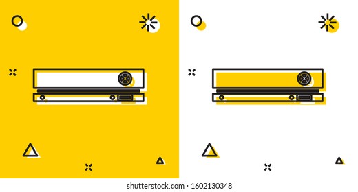 Black Video game console icon isolated on yellow and white background. Random dynamic shapes. Vector Illustration