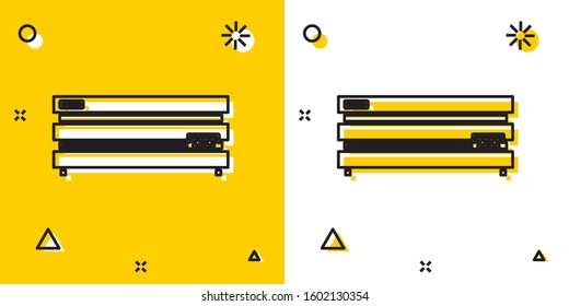 Black Video game console icon isolated on yellow and white background. Random dynamic shapes. Vector Illustration