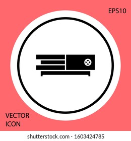 Black Video game console icon isolated on red background. White circle button. Vector Illustration