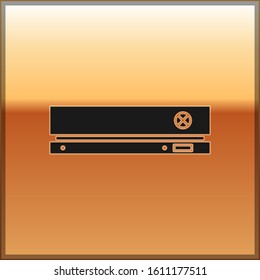 Black Video game console icon isolated on gold background.  Vector Illustration