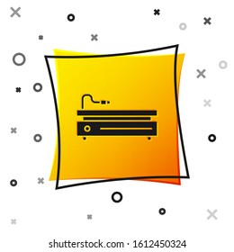 Black Video game console icon isolated on white background. Yellow square button. Vector Illustration