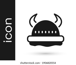 Black Viking in horned helmet icon isolated on white background.  Vector