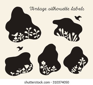 Black vintage patch label vignette with bird and flower silhouette illustration with cream background with space for lettering