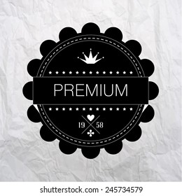 Black vintage premium label on crumpled paper background