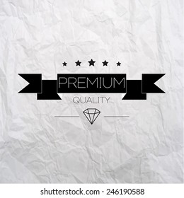 Black vintage premium label on crumpled paper background