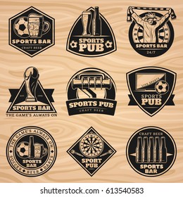 Black vintage sport bar labels set with equipment fan and beer elements on wooden background isolated vector illustration