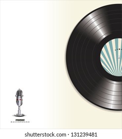 Black vinyl record and old microphone