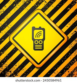 Black Walkie talkie icon isolated on yellow background. Portable radio transmitter icon. Radio transceiver sign. Warning sign. Vector