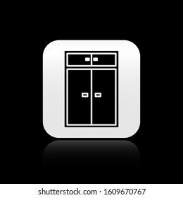 Black Wardrobe icon isolated on black background. Silver square button. Vector Illustration