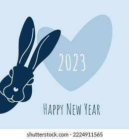 Año de conejo de agua negra. Silueta de cabeza de conejo, silueta de corazón, 2023. Ilustración vectorial aislada en un fondo azul claro para postales e invitaciones a fiestas de Año Nuevo.