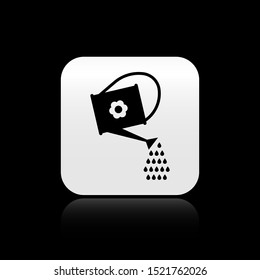Black Watering can icon isolated on black background. Irrigation symbol. Silver square button. Vector Illustration