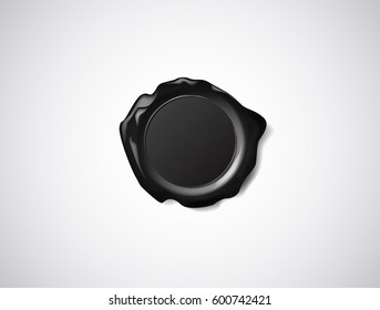 Black wax seal, signet or stamp isolated on white