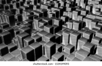 Black and white abstract background with dotted pattern. 
Halftone effect - vector