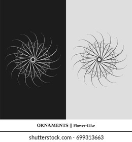 Black and white abstract and isolated ornaments. Sophisticated circular organic vectors that resemble star, flower, floral or atom geometric shapes.