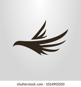 Black and white abstract simple vector symbol of flying bird