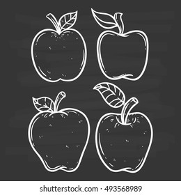 black and white apple set using doodle art or hand drawing style on chalkboard background