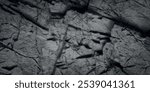 Black and white background. Gray rock texture. Grunge stone background. The texture of the mountains.