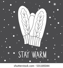 Black and white background with mittens, snow and text. Backdrop with symbol of warmth. Stay warm, hand drawn poster design. Illustration with object and wish