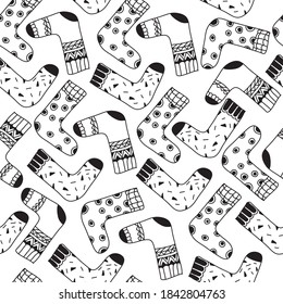 Black and white background with socks doodle various outline for coloring.