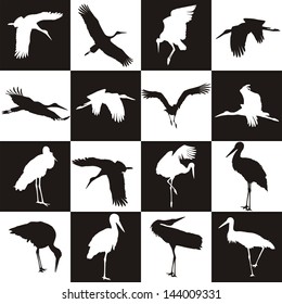 Black and white background with storks