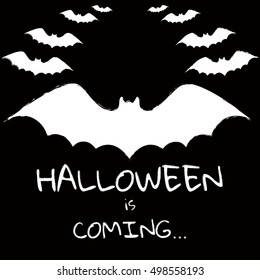 Black and white background with text "Halloween is coming",  large bat wings and many small bats