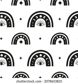 Black and white boho seamless pattern with rainbows, moon phases and third eye. Bohemian modern background. Celestial wrapping paper.