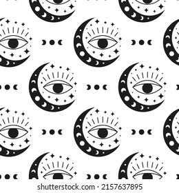 Black and white boho seamless pattern with crescents, seeing eyes, moon phases and stars. Bohemian modern background. Celestial wrapping paper.