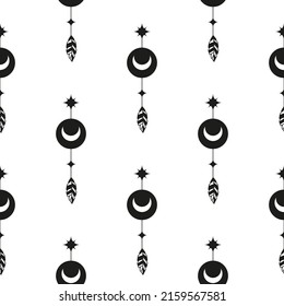 Black and white boho seamless pattern with crescent moon and feathers. Bohemian modern background. Celestial wrapping paper.