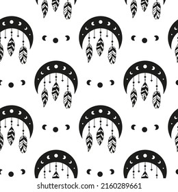Black and white boho seamless pattern with crescent, moon phases, stars and feathers. Bohemian modern background. Celestial wrapping paper.