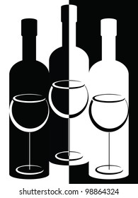 Black and white bottles and wine glasses