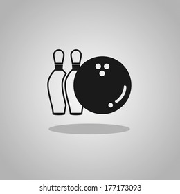 Black and white bowling ball with pins.
