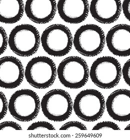 Black and white brush drawn circles seamless vector pattern
