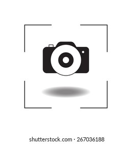 Black and white camera icon with eye stylized lens