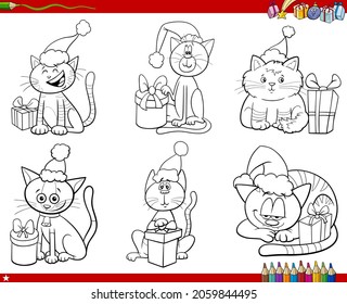 Black and white cartoon illustration of cats animal characters on Christmas Time set coloring book page